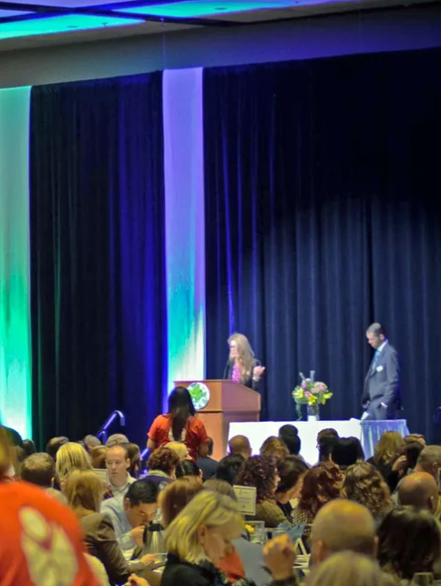 Elizabeth speaking on stage